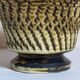 Ceramic planter with vintage scarifications from the 1950s