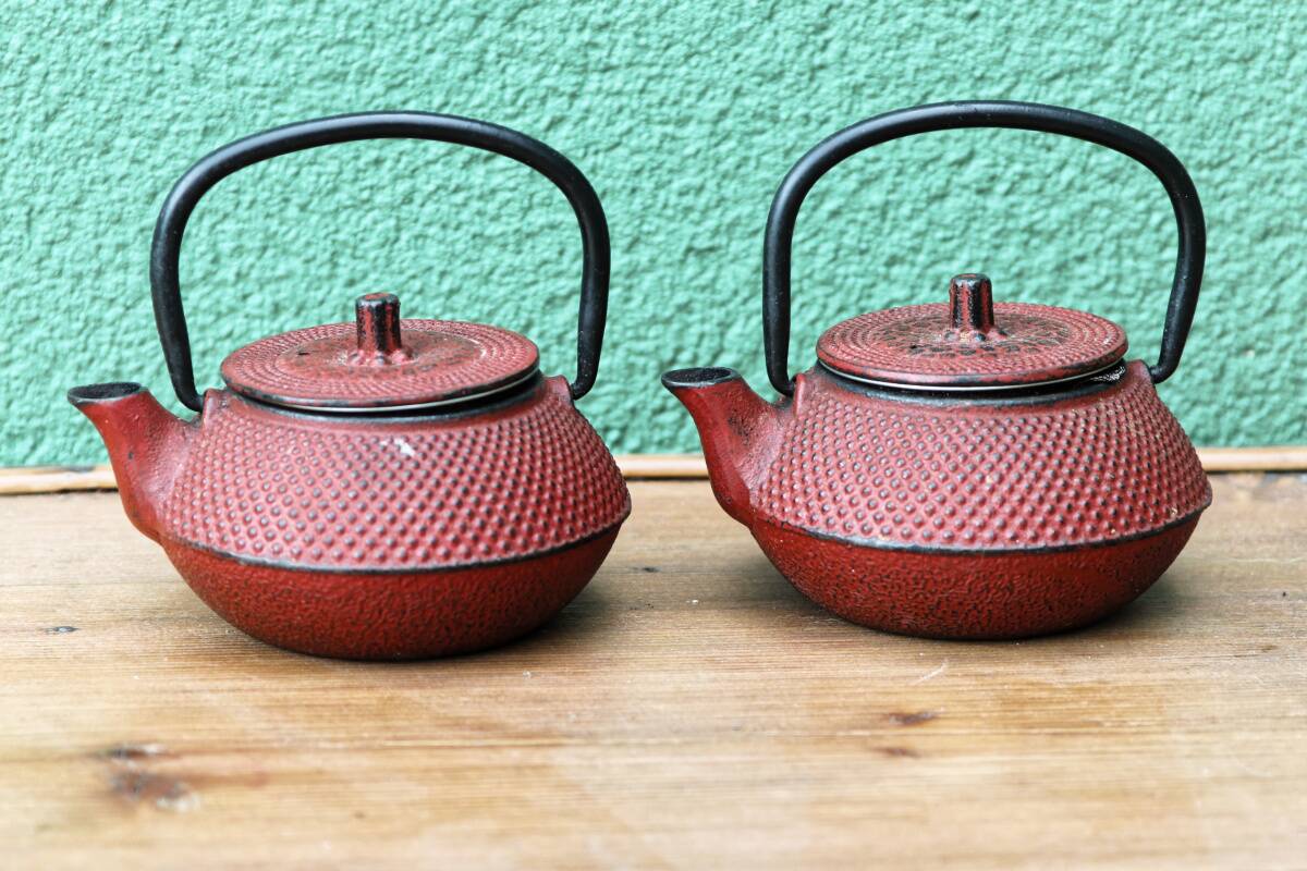 Pair of individual Japanese teapots