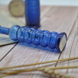 Set of 4 blue bottles of decoration
