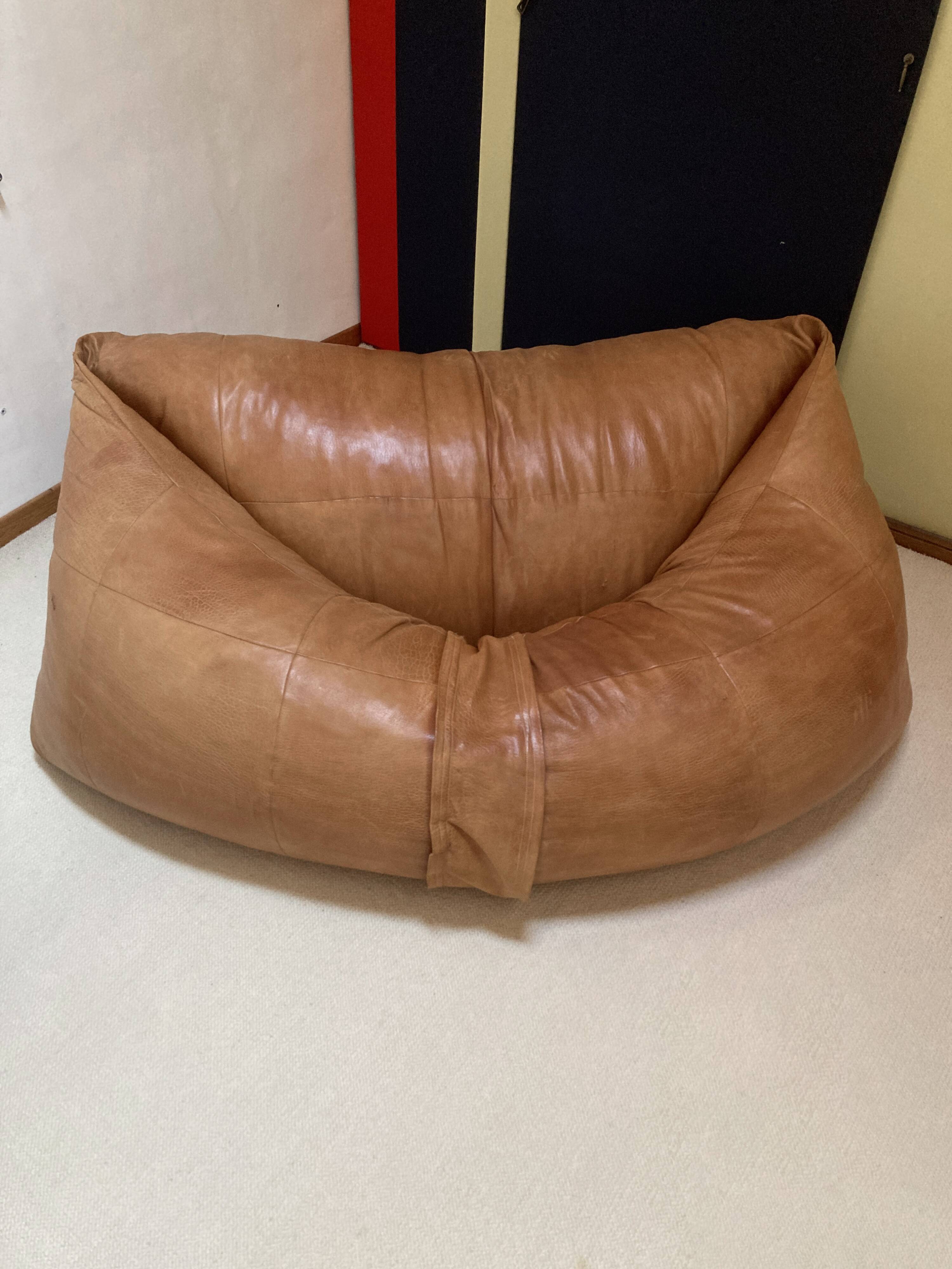 Two-seater leather pouf sofa by Raphaël Raffel for Honoré Paris
