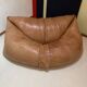 Two-seater leather pouf sofa by Raphaël Raffel for Honoré Paris