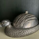 Serving dish with bell in silver metal shape duck