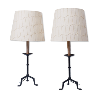 Pair of black forged iron lamps, 1960s.