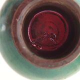 Green pot-bellied ceramic vase with foot and high, narrow neck in signed raku