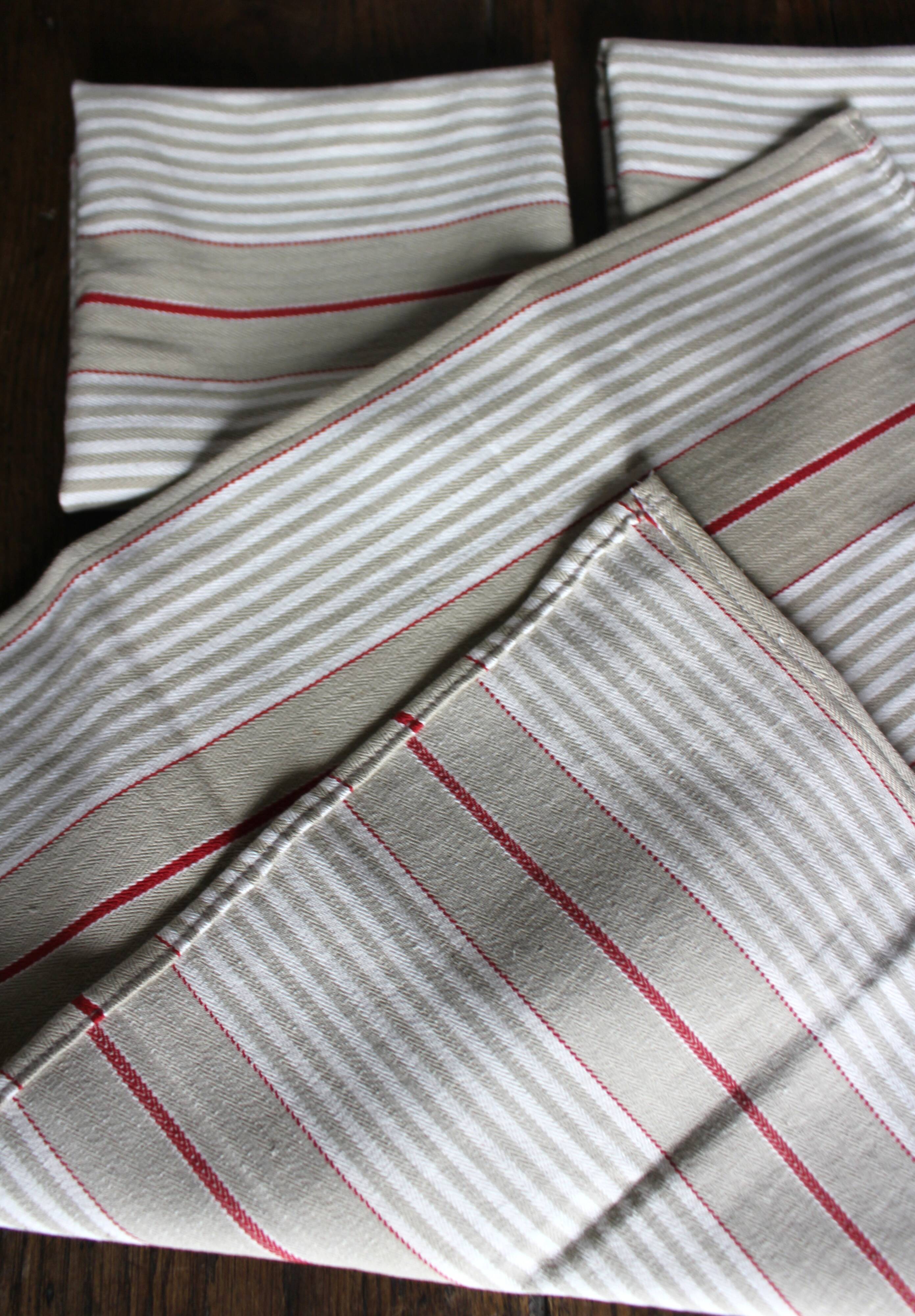 6 beige and red mattress cloth napkins
