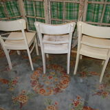 3 white chairs
