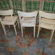 3 white chairs