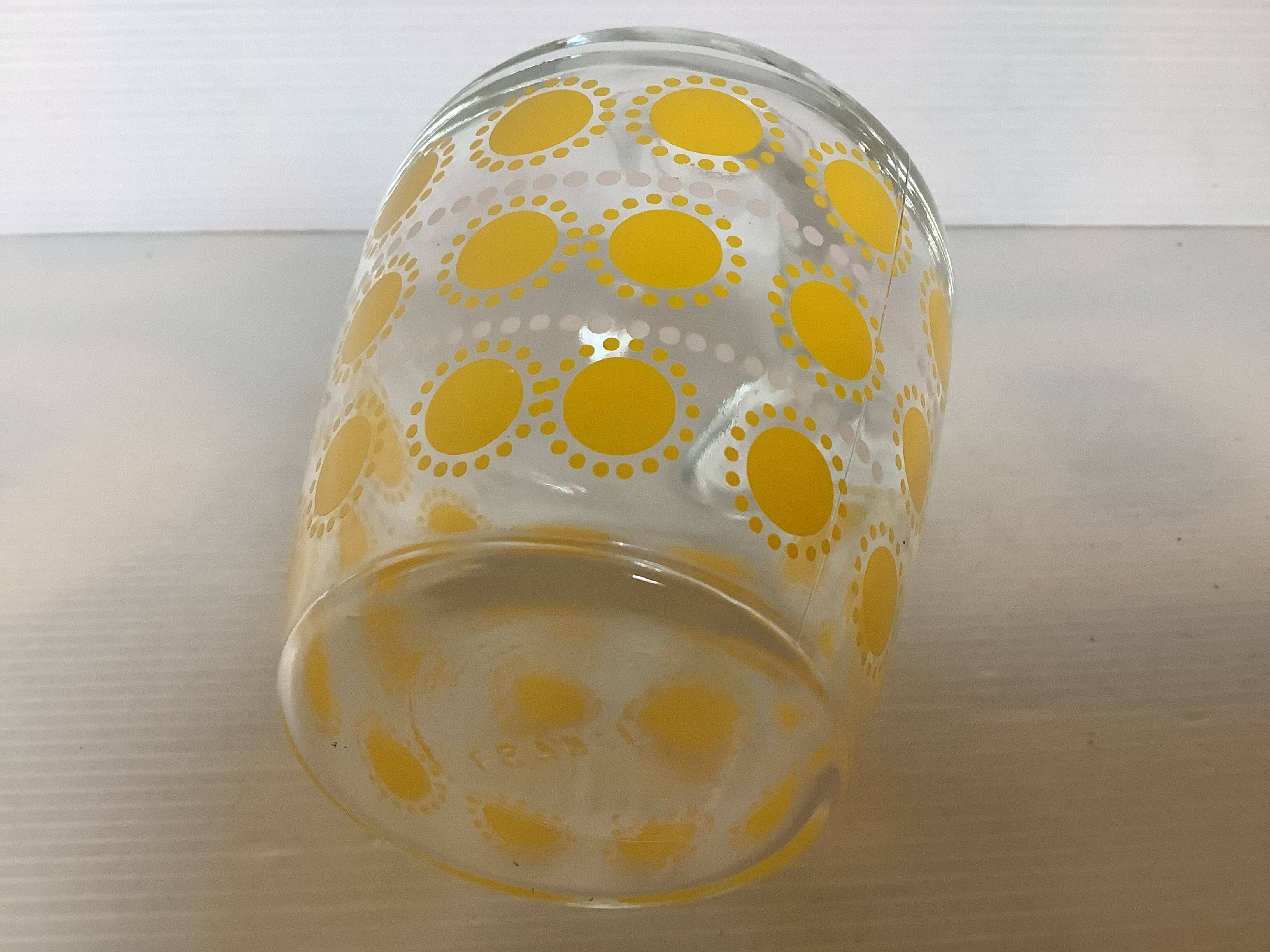 Liqueur service with multicoloured polka dot patterns.