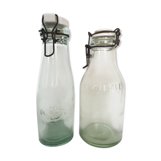 Pair of moulded glass bottles