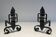 Pair of Wrought Iron Andirons with Obelisk and Belt Motifs