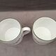 Two ceramic mug pot covers mugs mugs vases
