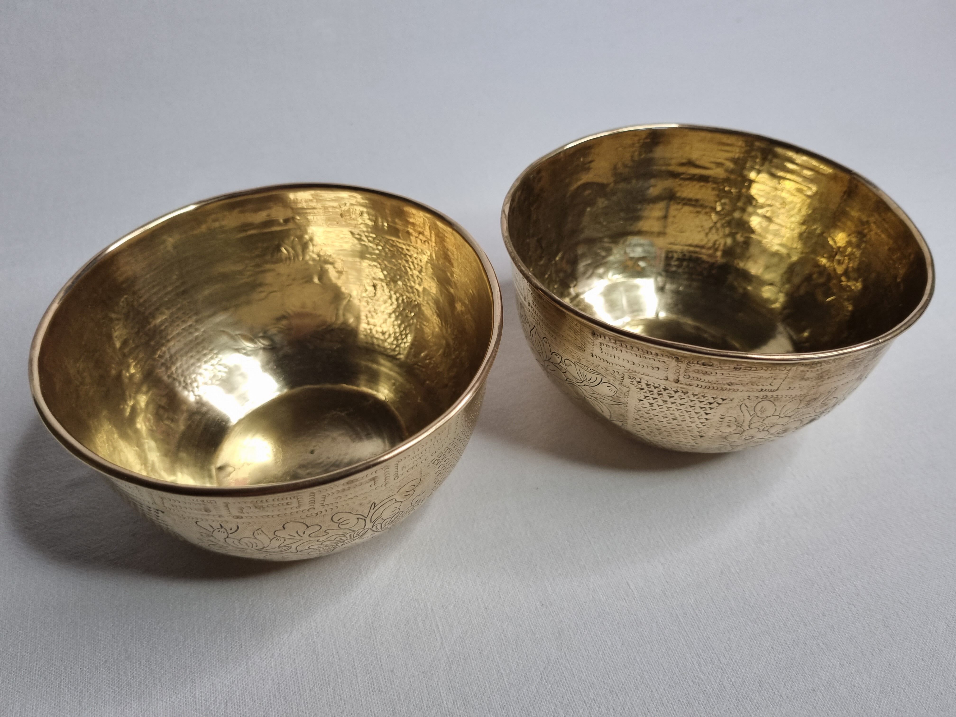 Pair of vintage Indian hammered metal bowls