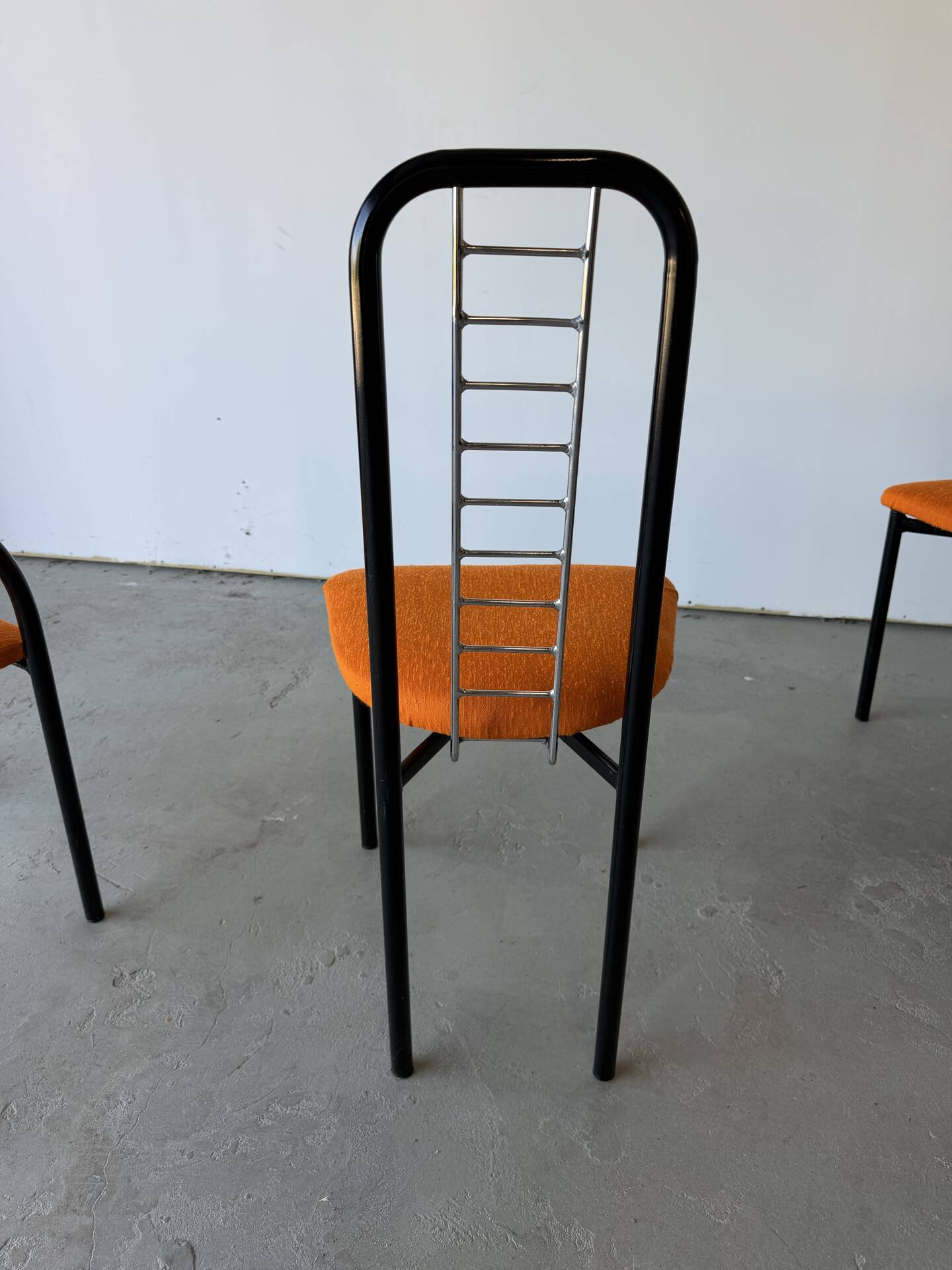 Set of 4 Italian design chairs in vintage black metal and chrome.