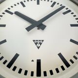 Industrial grey factory wall clock from pragotron, 1960s