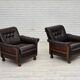 Fauteuil scandinave années 1970, cuir d'ameublement marron, pieds en bois de teck.