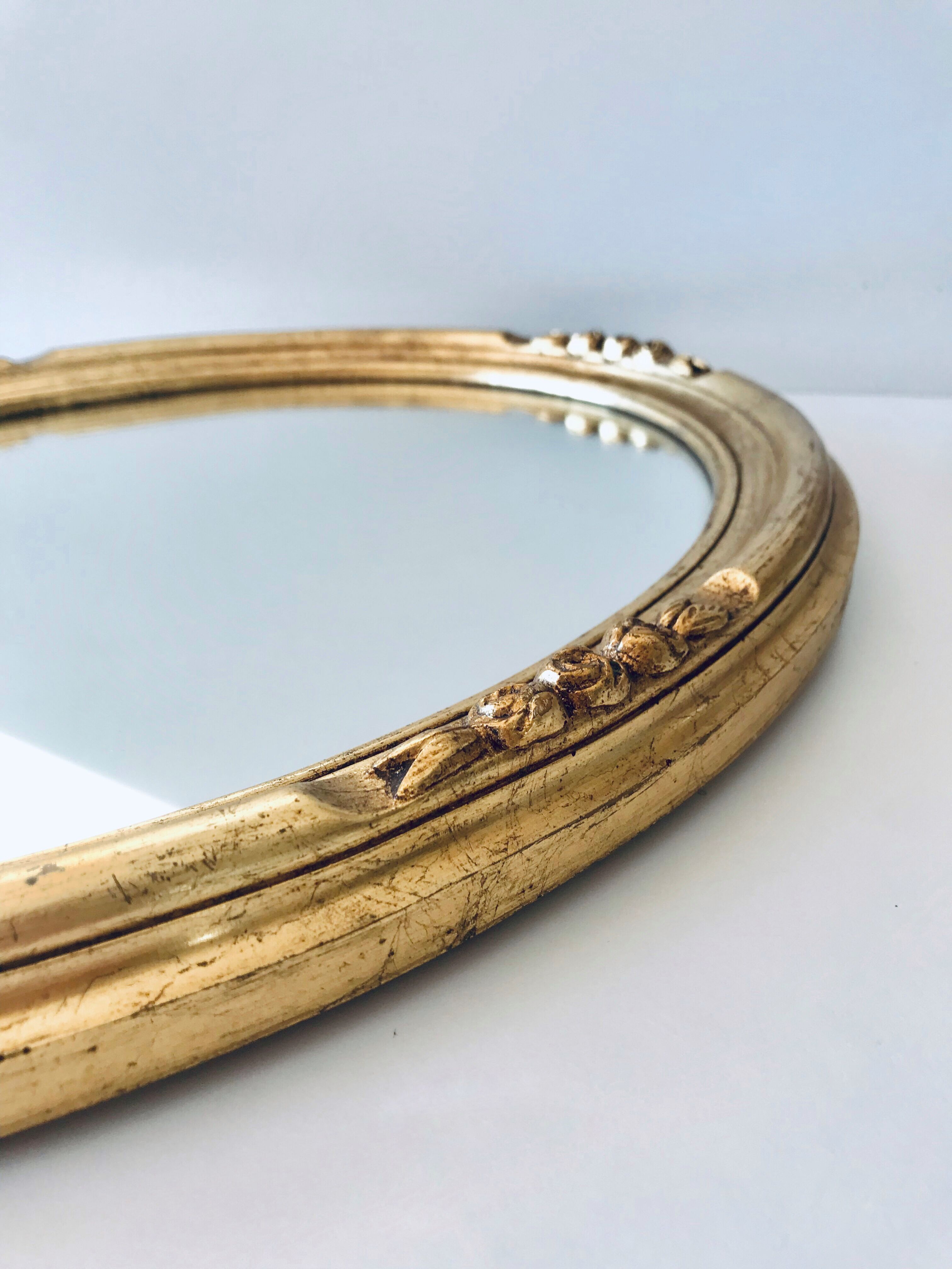 Golden oval mirror - 36 x 47