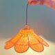 Suspension fleur en rotin