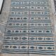 Traditional handmade white and blue kilim rug in natural wool