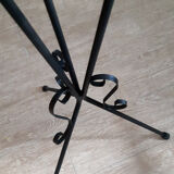 Plant holder in black wrought iron.