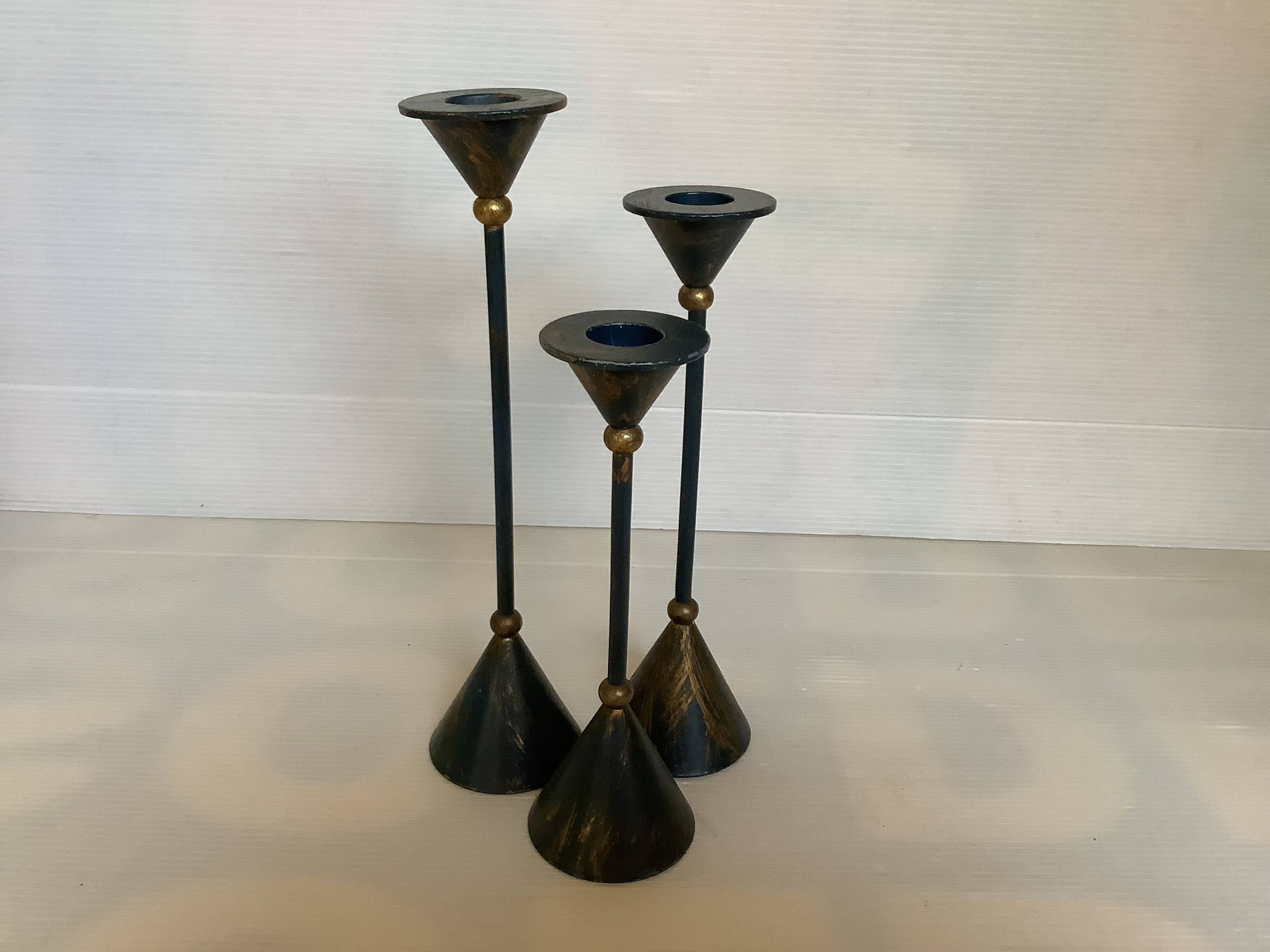 Trio of vintage blue and gold candlesticks