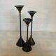 Vintage trio of blue and gold metal candle holders