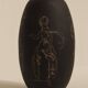 Ceramic vase decorated with women and a tree.