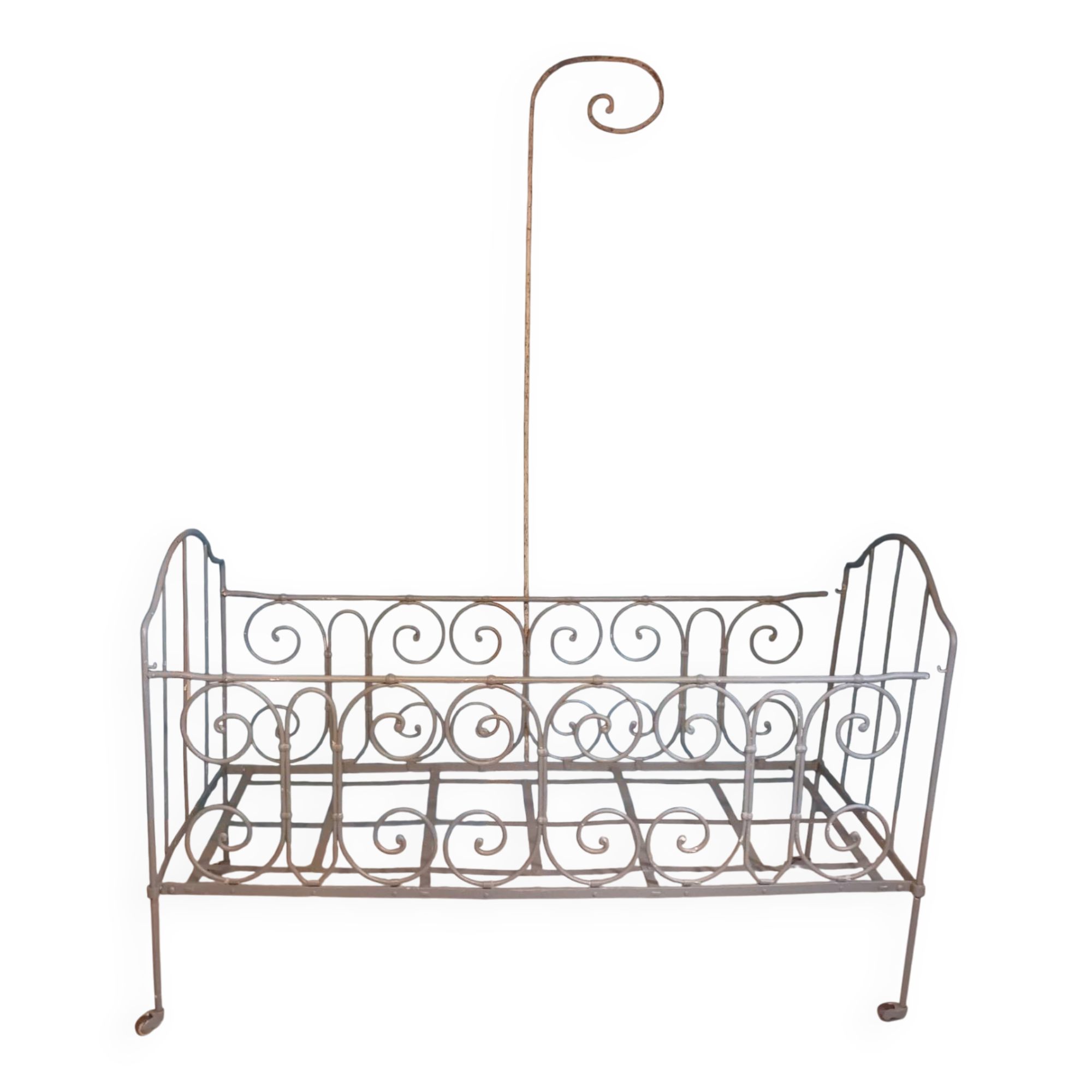 Wrought iron children's bed from the late 19th century.