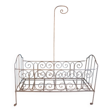 Wrought iron children's bed from the late 19th century.