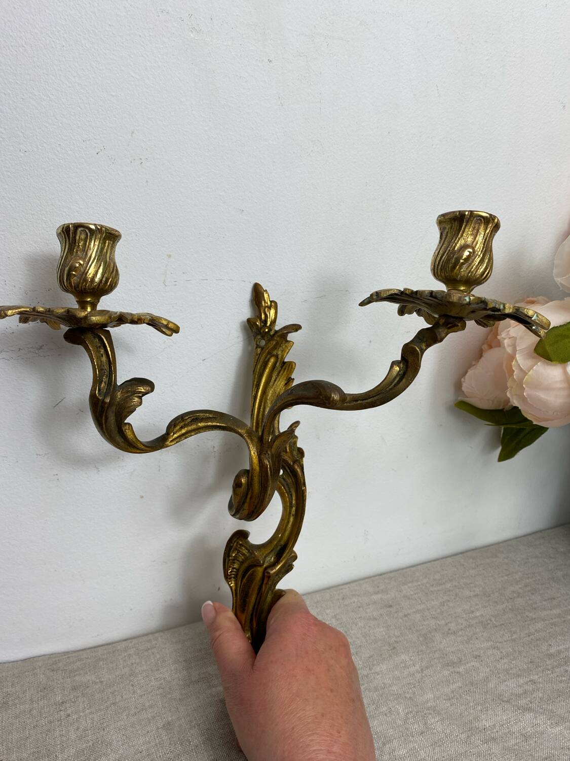 Two Louis XV style bronze wall candlesticks