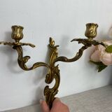 Two Louis XV style bronze wall candlesticks