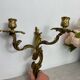 Two Louis XV style bronze wall candlesticks