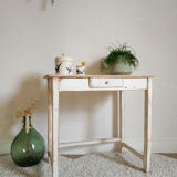 Old table in patinated white wood
