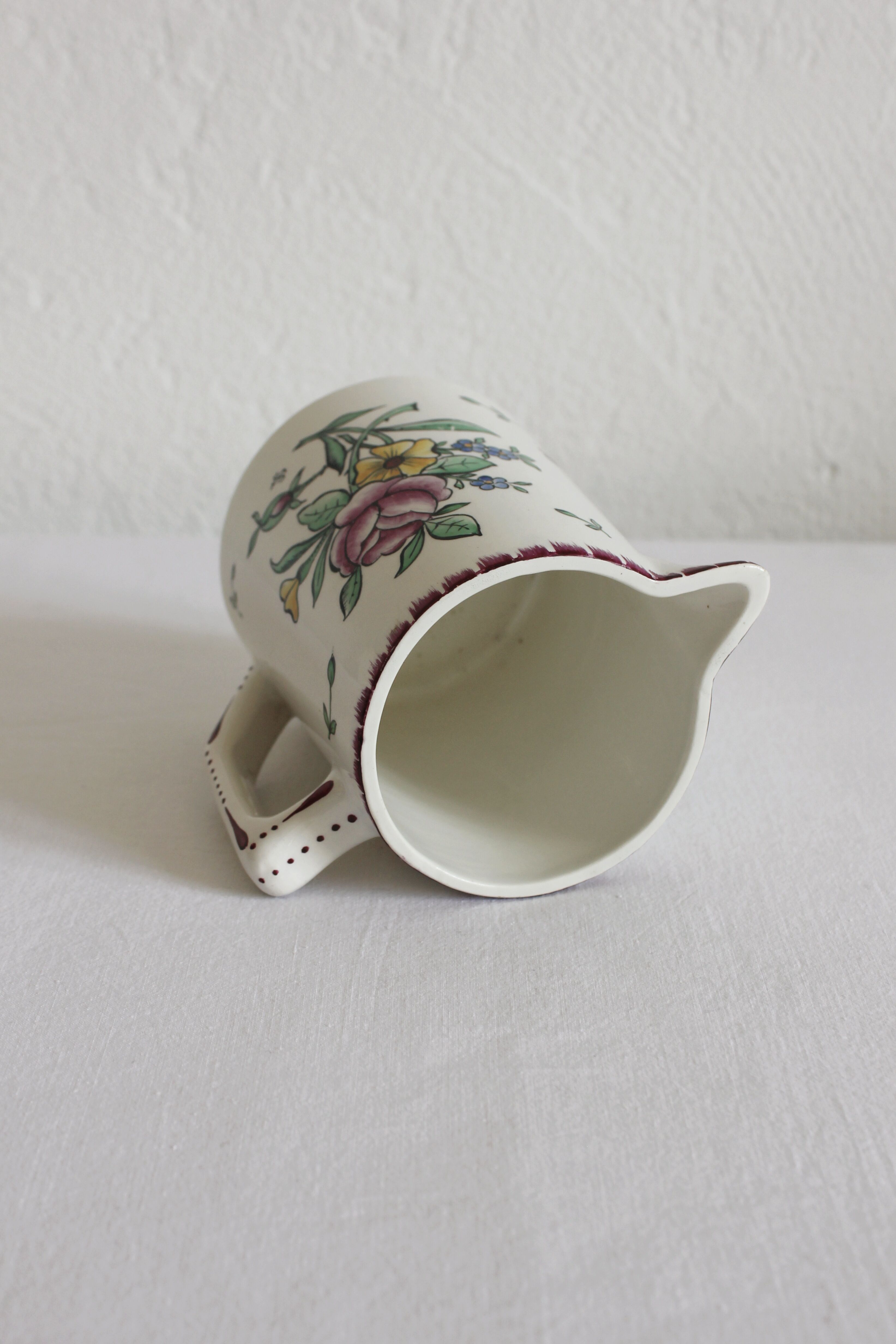 Earthenware jug with floral decoration from Digoin Sarreguemines.