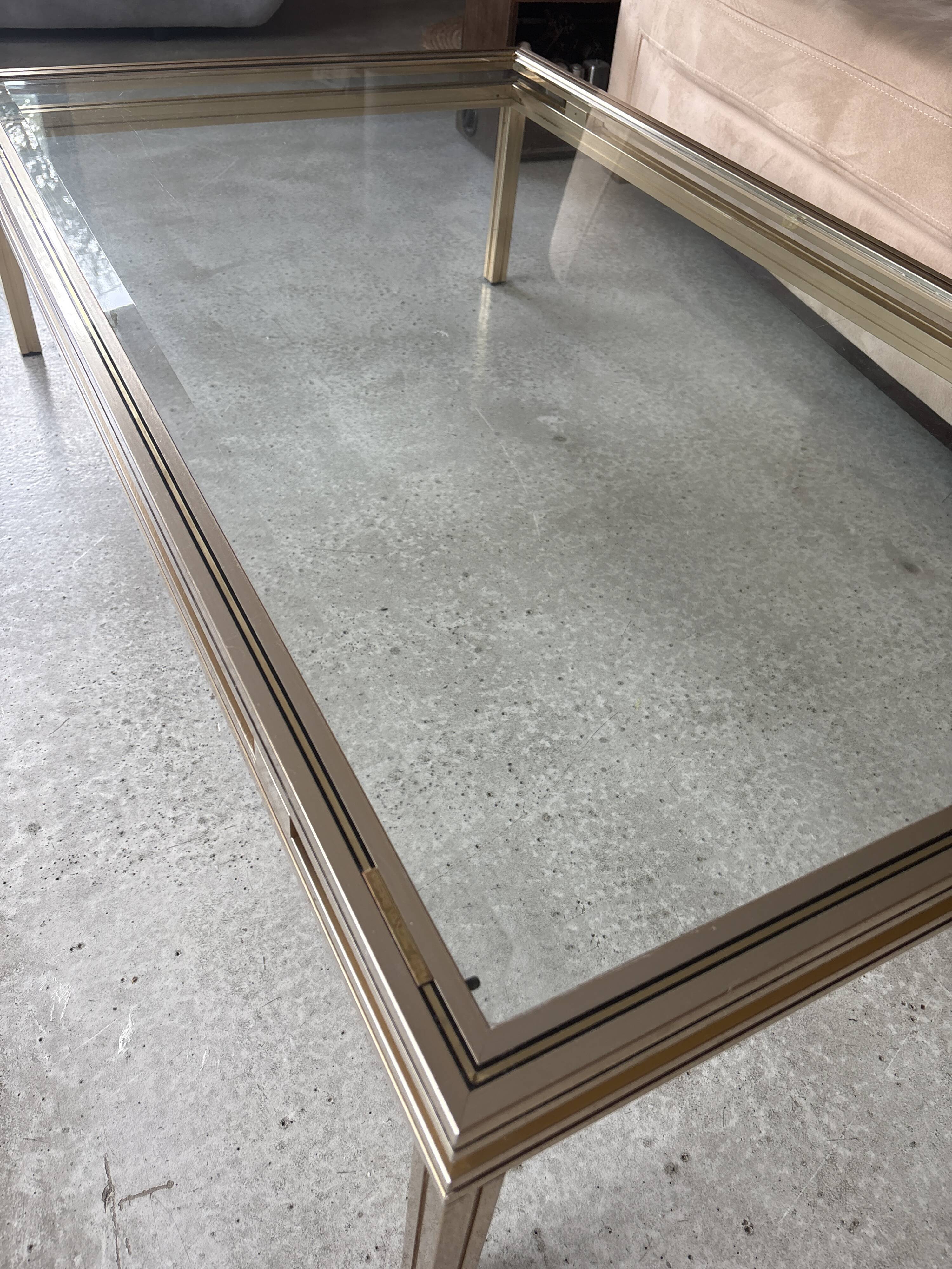 Brass/glass table designed by Pierre Vandel Paris
