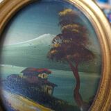 2 miniature paintings in golden frames