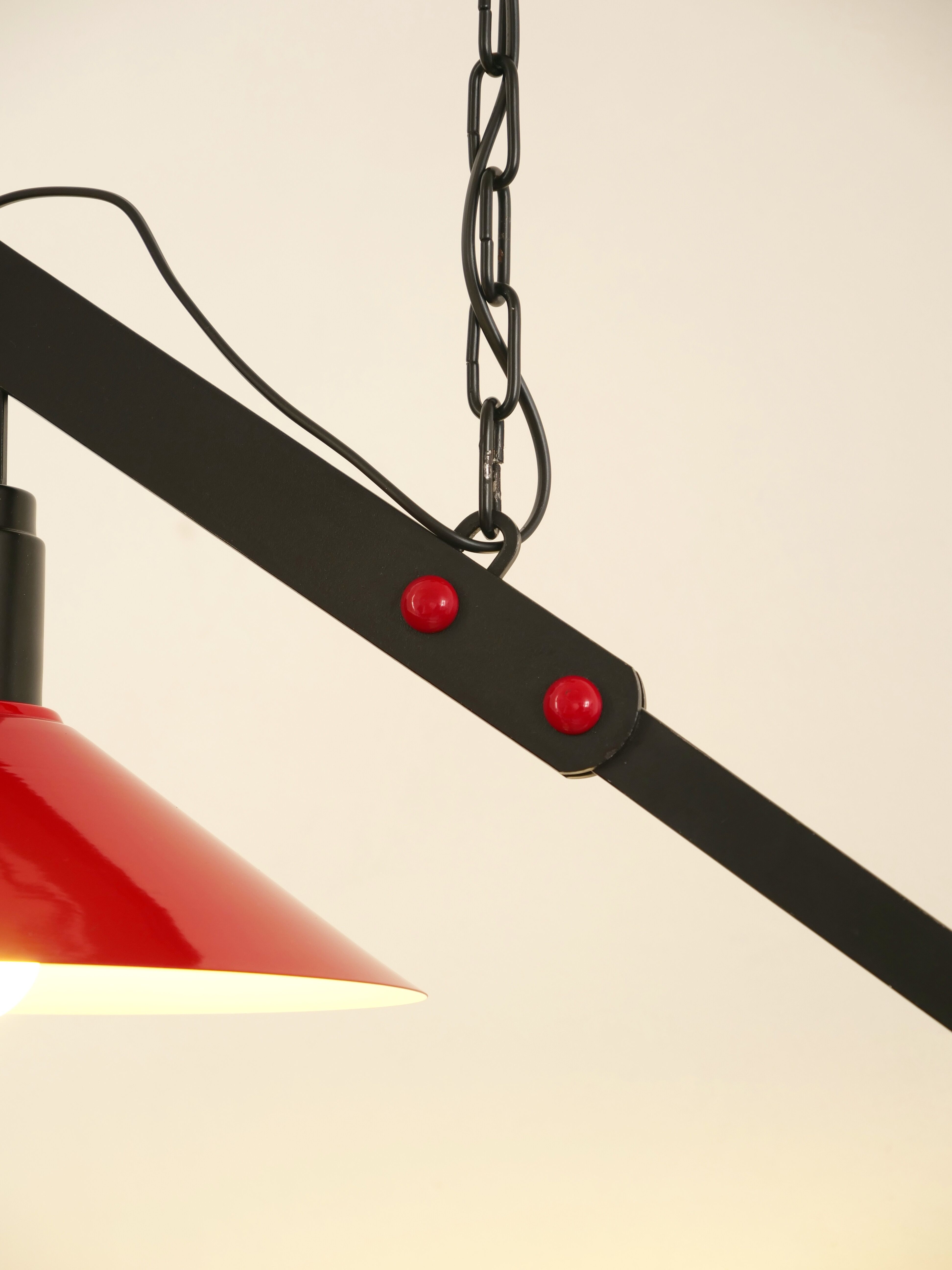 Danish suspension with balance counterweight