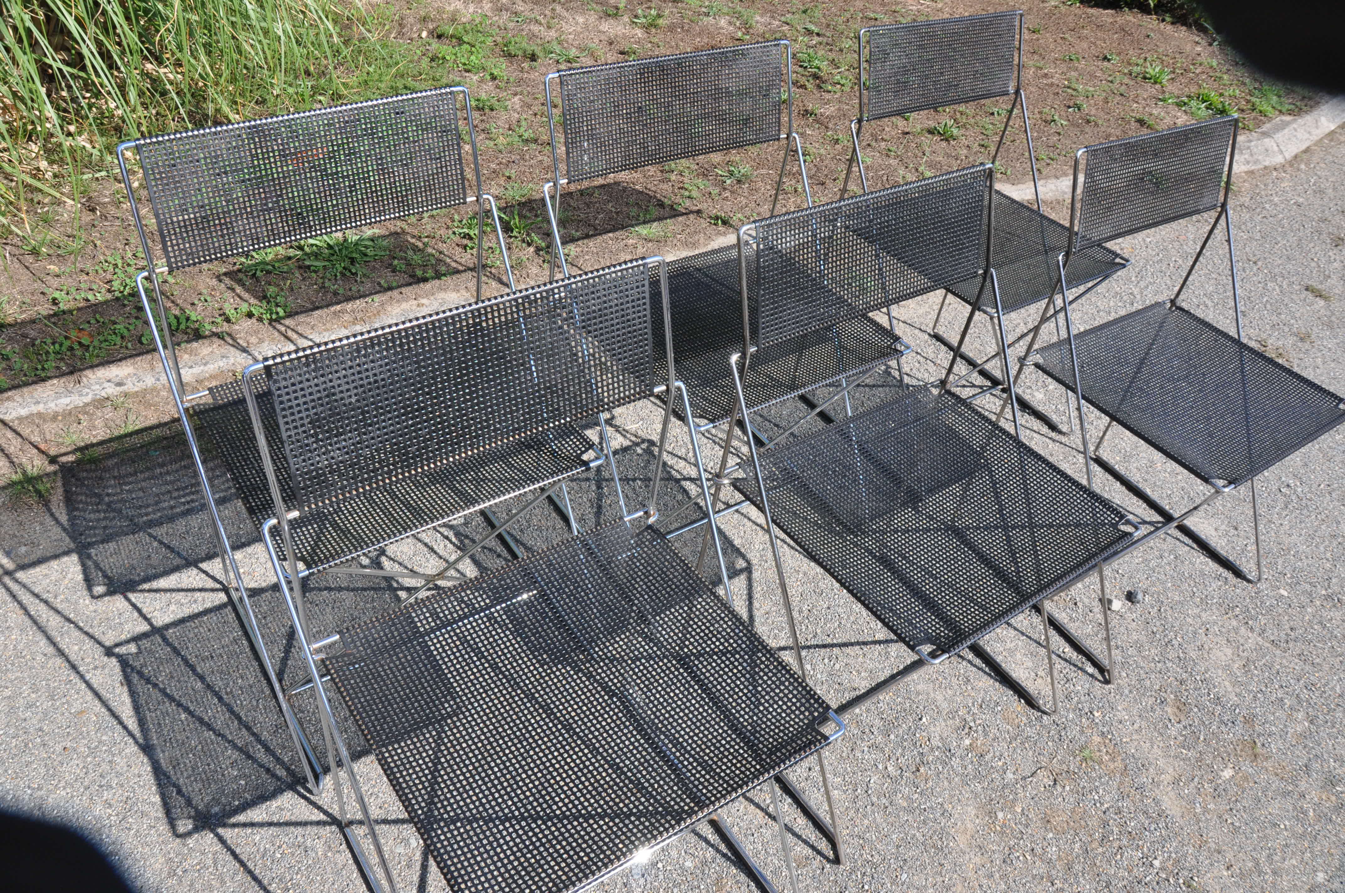 Nuova x line omli chairs by Niels Jørgen Haugesen