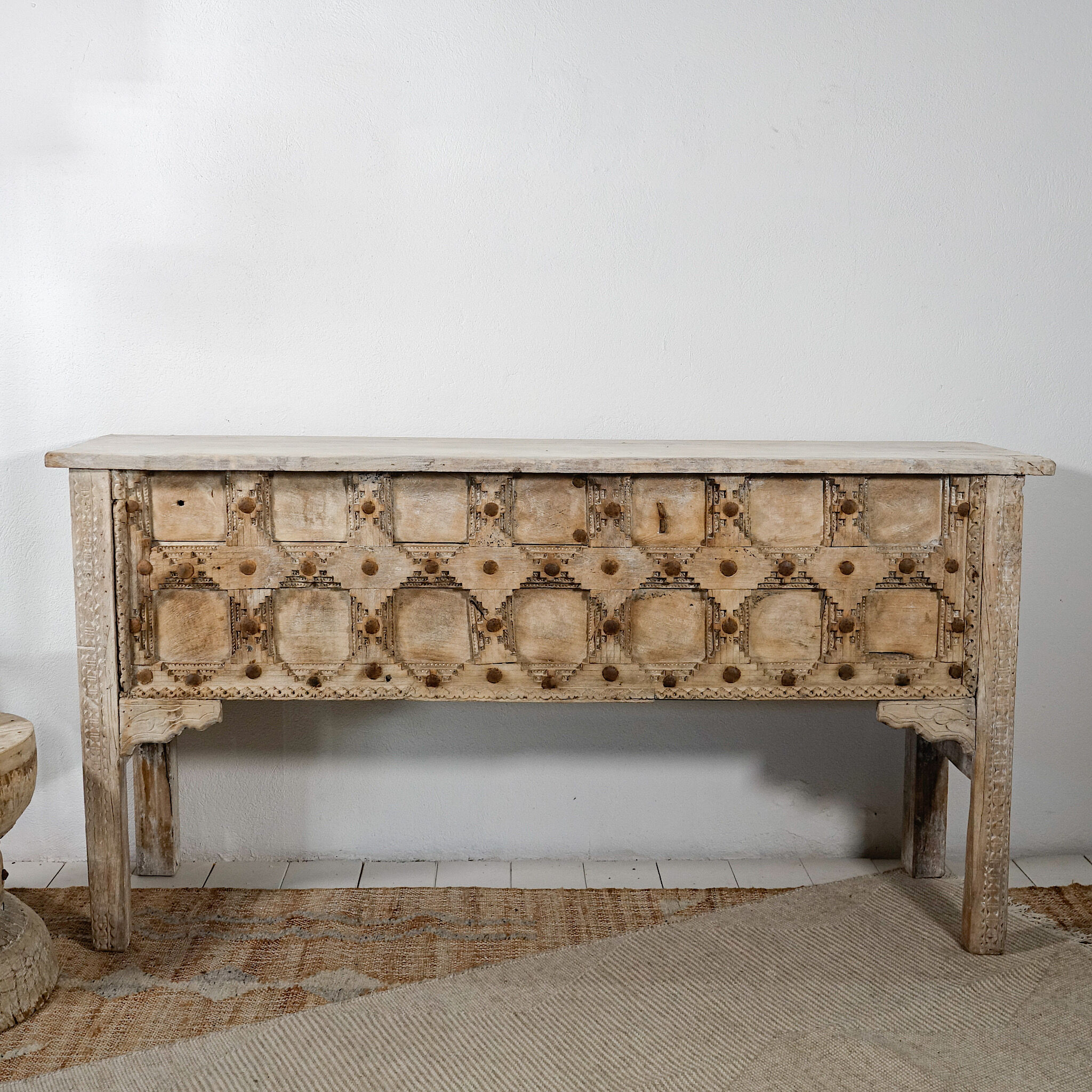 Carved wooden console