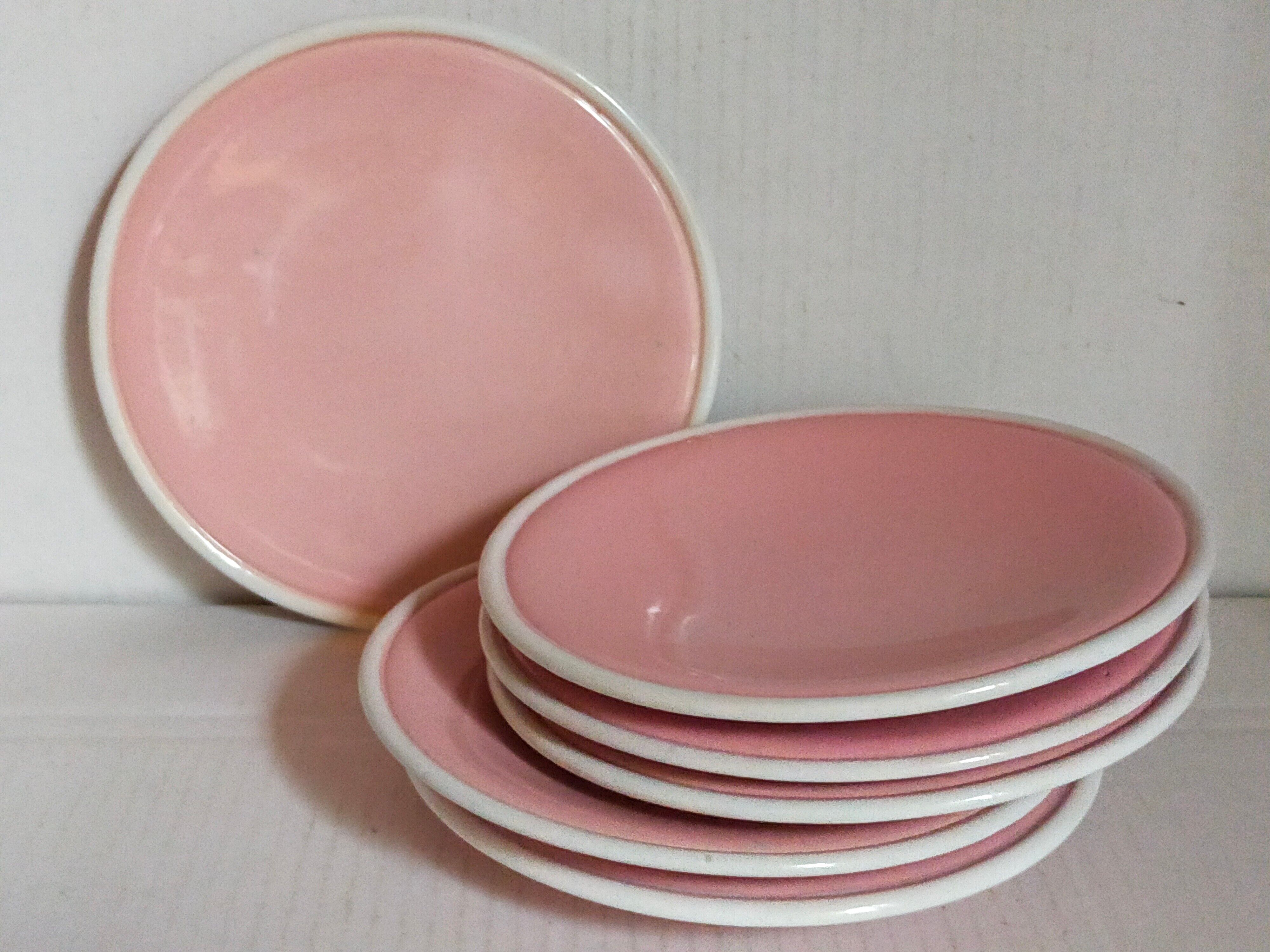 Six old pink earthenware dessert plates