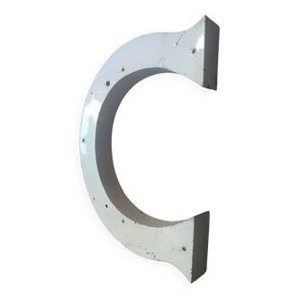White metal sign letter C