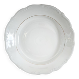 Hollow round plate in porcelain, double gold rim manufacture.