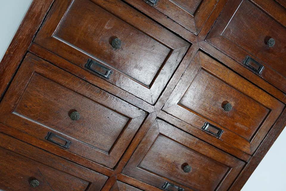 1870s oak apothecary cabinet