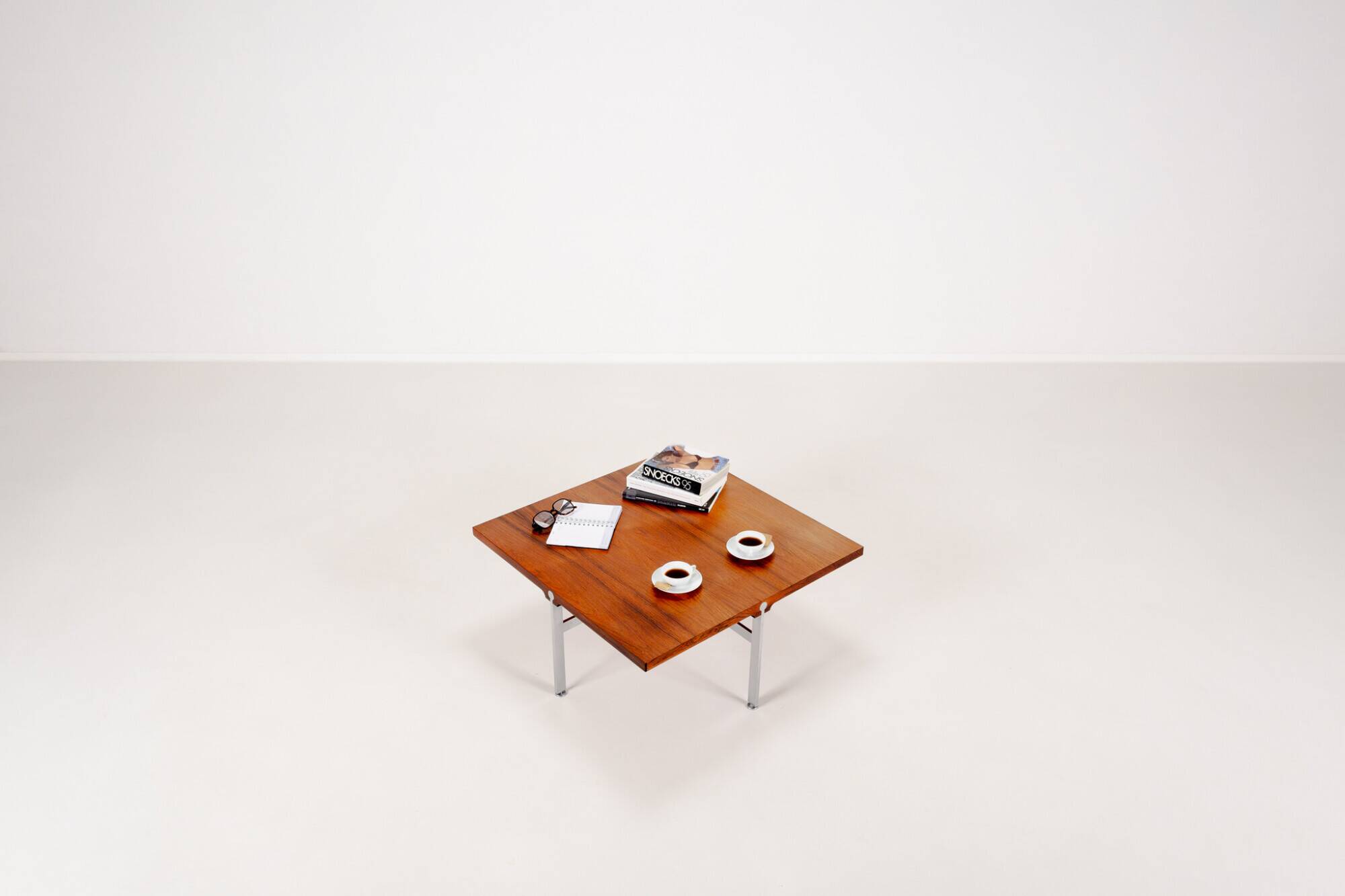 Coffee table in rosewood by Sven Ellekaer