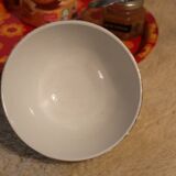 Antique earthenware bowl, pastel yellow