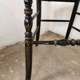 Black chair Napoleon III year, with gilding