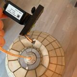 Mother-of-pearl and brass suspension