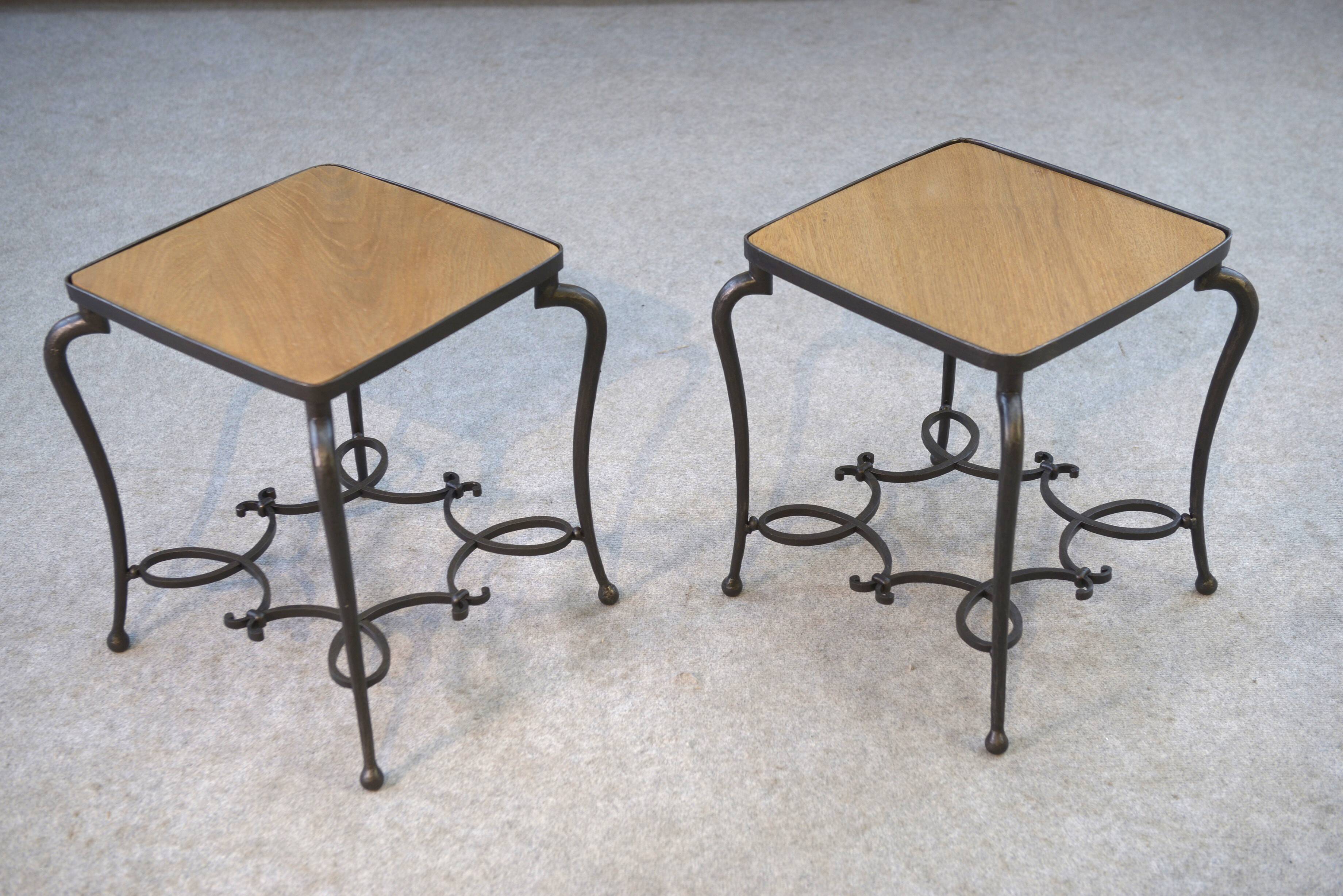 Pair of wrought iron side tables with oak tops, French work