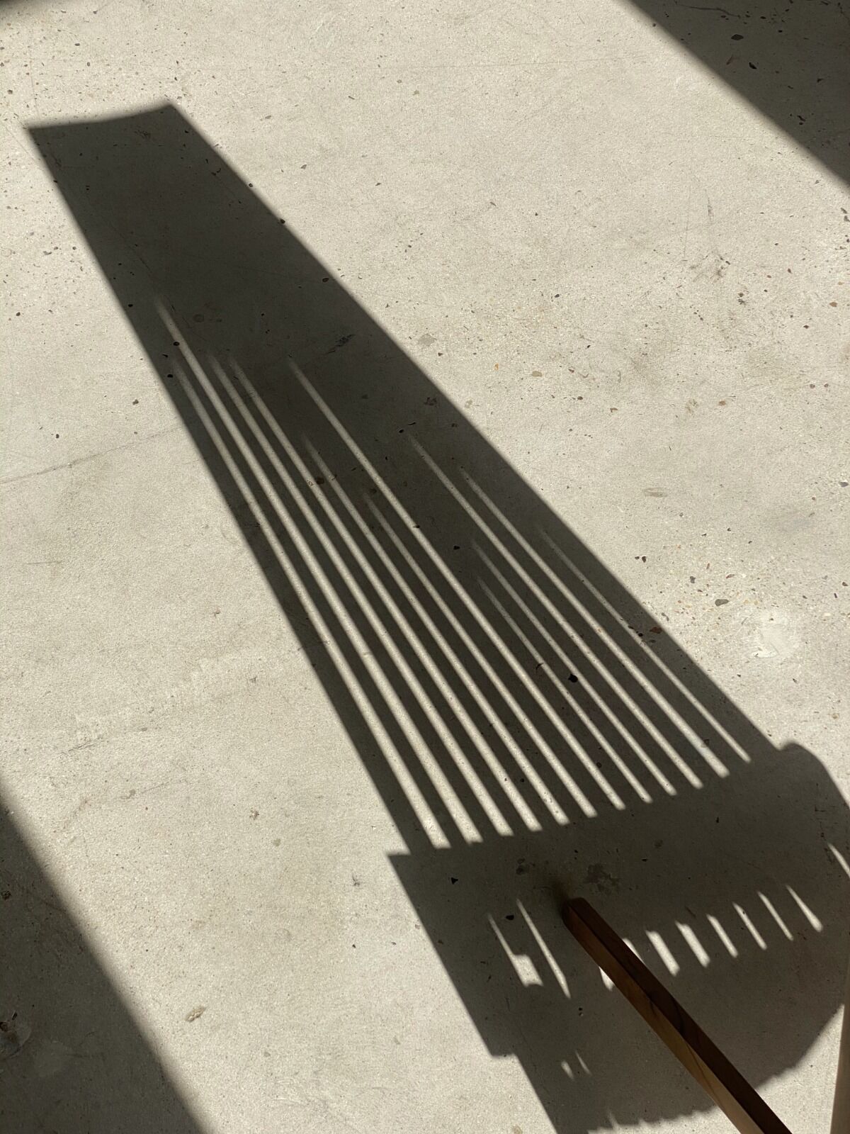 Foldable designer armchair in wooden slats