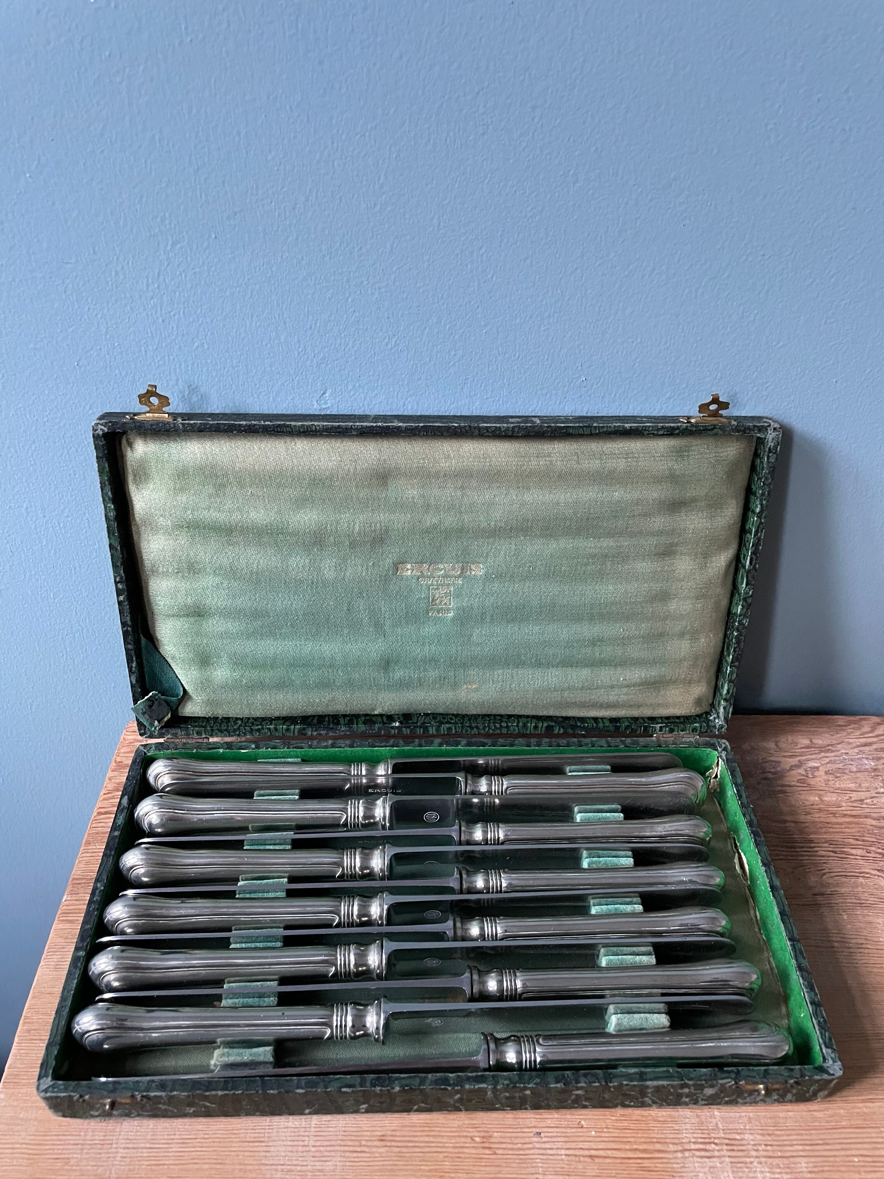 12 antique Ercuis table knives in silver metal