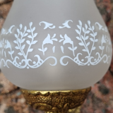 Pair of bronze wall lamps and frosted glass globe, early twentieth century.